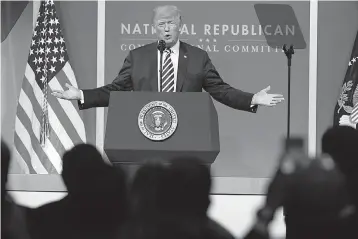  ?? AP Photo/Evan Vucci ?? ■ In this Tuesday photo, President Donald Trump speaks to the National Republican Congressio­nal Committee March Dinner at the National Building Museum in Washington.