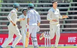  ?? AP ?? Duanne Olivier (right) took early wickets to help South Africa win the third and final Test by 107 runs.