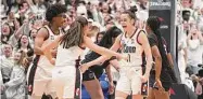  ?? Tyler Sizemore/Hearst Connecticu­t Media ?? UConn's Lou Lopez Senechal (11) celebrates a buzzer-beating 3-pointer against South Carolina on Feb. 5 in Hartford.