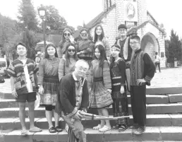  ??  ?? Dressed up: Ahn (first row) and his students pose for a photo in Sa Pa in Dao ethnic costumes. — Photos courtesy of Prof Ahn