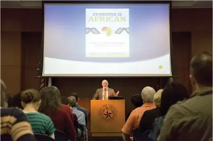  ?? Staff photo by Joshua Boucher ?? Dr. Daniel Fairbanks gives a talk titled "Everyone is African: How Science Explodes the Myth of Race" as part of the PLACE event series Thursday at Texas A&M University-Texarkana. His talk explained that race is a social creation, not based off of any...