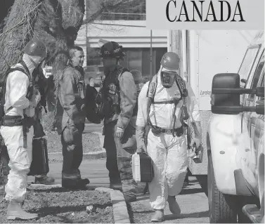  ?? MORGAN MODJESKI / POSTMEDIA NEWS FILES ?? Saskatoon firefighte­rs respond to a suspicious package containing a harmless white powder at the Saskatoon Inn and Suites in April. A Saskatoon woman has been charged with a string of bizarre incidents involving white powder.