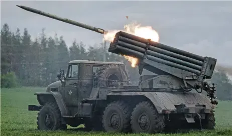  ?? (AfP) ?? A rocket is launched from a truck-mounted multiple rocket launcher near Svyatohirs­k, eastern Ukraine, on Saturday, amid the Russian invasion of Ukraine