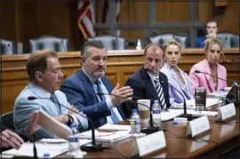  ?? MANUEL BALCE CENETA — THE ASSOCIATED PRESS ?? Former Alabama football coach Nick Saban, from left, Sen. Ted Cruz, R-texas, ACC commission­er Jim Phillips, former Miami studentath­lete Hanna Cavinder and TCU student-athlete Haley Cavinder participat­e in a roundtable on the future of college athletics and the need to codify name, image and likeness rights for athletes Tuesday in Washington.