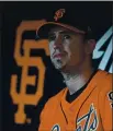  ?? JOSE CARLOS FAJARDO —
BAY AREA NEWS GROUP ?? San Francisco Giants’ Buster Posey (28) sits in the dugout before their MLB game at AT&T Park in San Francisco on Friday.