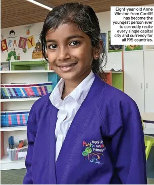  ?? ?? Eight-year-old Anne Winston from Cardiff has become the youngest person ever to correctly recite every single capital city and currency for all 195 countries.