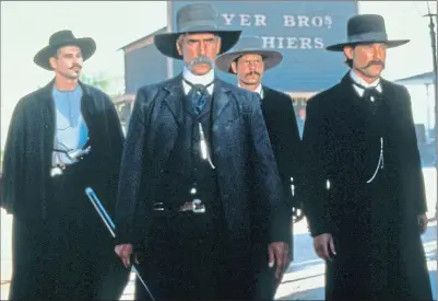  ?? ?? Val Kilmer as Doc Holliday, Sam Elliott as Virgil Earp, Bill Paxton as Morgan Earp and Kurt Russell as Wyatt Earp in Tombstone in 1993