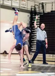  ?? TIM GODBEE / For the Calhoun Times ?? Calhoun’s Owen Mendez (right) looks for a takedown of Gordon Central’s Jasper Stepp on Wednesday.