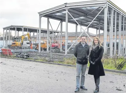  ??  ?? Scott and Sarah Raeburn check on the progress of their new company headquarte­rs in Kirkcaldy.