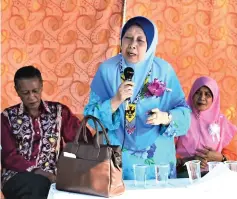  ??  ?? Habsah delivers her speech at the function. At left is Willie.