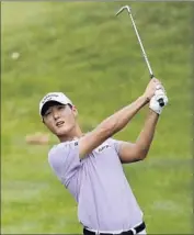  ?? Tony Dejak
Associated Press ?? DANNY LEE, HITTING from the 10th fairway at Firestone Country Club, made seven birdies.