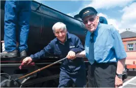  ?? THoMAS BRIGHT/SR ?? You’ve missed a bit… David Porter, the man who saved No. 45110 from scrap in 1968, is reunited with the ‘Fifteen Guinea Special’ veteran as Maurice Burns and the ‘Master Neverers’ set to work with the cleaning rags.