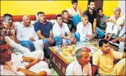  ?? HT PHOTO ?? Family members and neighbours watching the athlete performing in the Asian Games in Indonesia on Monday.