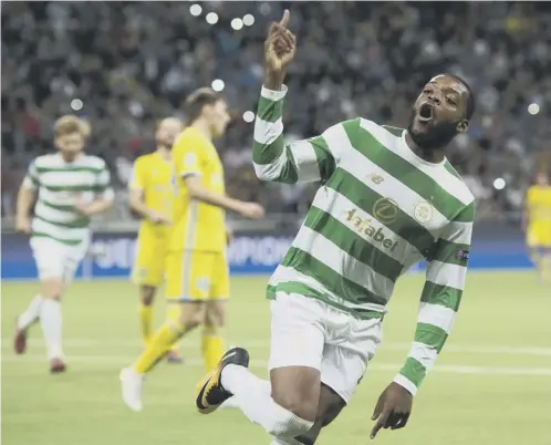  ??  ?? 0 Olivier Ntcham celebrates the goal which made it 4-2 and eased any sense of anxiety for Celtic against Astana in Kazakhstan.