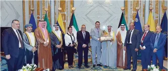  ??  ?? His Highness the Amir Sheikh Sabah Al-Ahmad Al-Jaber Al-Sabah meets with Minister of Health Dr Jamal Mansour Al-Harbi and members of the Gulf Union for Cancer Control.