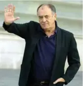  ??  ?? In this file photo taken on September 25, 2003 Italian film director Bernardo Bertolucci waves before the screening of his film ‘The Dreamers’, at the 51st San Sebastian Internatio­nal Film Festival. — AFP photos