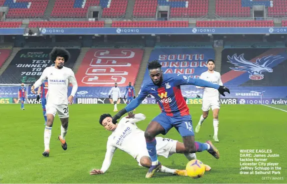  ?? GETTY IMAGES ?? WHERE EAGLES DARE: James Justin tackles former Leicester City player Jeffrey Schlupp in the draw at Selhurst Park