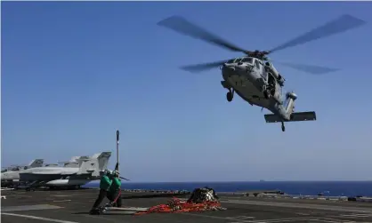  ?? Photograph: Amber Smalley/US Navy/AP ?? The aircraft carrier USS Abraham Lincoln in the Persian Gulf.