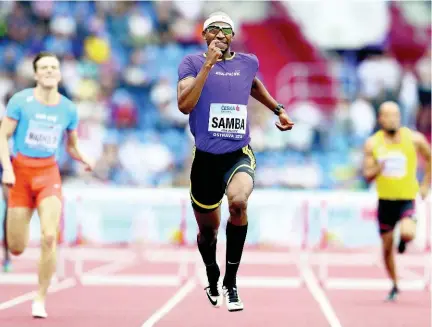  ??  ?? Abderrahma­n Samba of Qatar wins the men’s 400 meters hurdles for Asia-Pacific at the IAAF track and field Continenta­l Cup in Ostrava, Czech Republic, Saturday, September. 8, 2018.