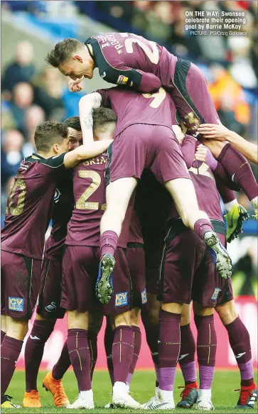  ?? PICTURE: PSI/Craig Galloway ?? ON THE WAY: Swansea celebrate their opening goal by Barrie McKay