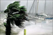  ??  ?? Ferocious: High winds whip up waves in Tampa, Florida, during Hurricane Jeanne in 2004