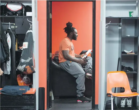  ?? — THE CANADIAN PRESS ?? ‘Every year you see guys you built something with and they leave,’ says B.C. Lions linebacker Solomon Elimimian, seen in the team’s clubhouse in Surrey on Tuesday. ‘At some point, we’re all going to exit the same door we came in.’