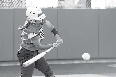  ?? Staff photo Joshua Boucher ?? Hughes Springs’ Marisol Kennedy unleashes on a Howe pitch Thursday at Texas A&M University in Commerce. Kennedy also pitched the final three innings in the Lady Mustangs’ 8-3 victory.