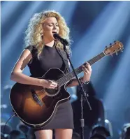  ??  ?? Tori Kelly says she named her new gospel album “Hiding Place” because “these songs, they’re where I feel safe.” ETHAN MILLER/GETTY IMAGES