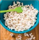  ?? The Associated Press ?? This recipe for microwave popcorn can be found in the Complete Cookbook for Young Chefs.