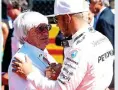  ?? GETTY ?? champion: ecclestone and Lewis Hamilton