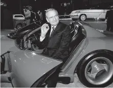  ?? Associated Press file photo ?? Lee Iacocca sits in a 1990 Dodge Viper sports car in 2000 during a tour. He saved the failing Chrysler Corp. in the 1980s.