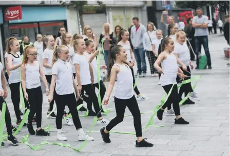  ??  ?? Sophie Doneathy Dance School perform at a street party to mark improvemen­ts in Sunderland City centre. Picture: Tom Banks
