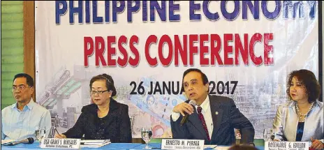  ?? MIKE AMOROSO ?? PHILIPPINE GDP BRIEFING: Socioecono­mic Planning Secretary Ernesto Pernia (third from left) answers queries from the press during yesterday’s briefing on the fourth quarter and annual performanc­e of the local economy. Joining him are (from left) deputy...