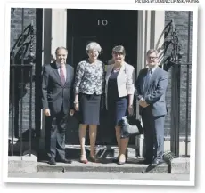  ??  ?? Theresa May with DUP leader Arlene Foster, DUP deputy leader Nigel Dodds and MP Sir Jeffrey Donaldson outside 10 Downing Street.