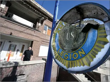  ?? PHOTOS BY WILL LESTER — STAFF PHOTOGRAPH­ER ?? Javier Hinostroza, commander of American Legion Charles P. Rowe Post 30, stands outside the facility in Pomona.