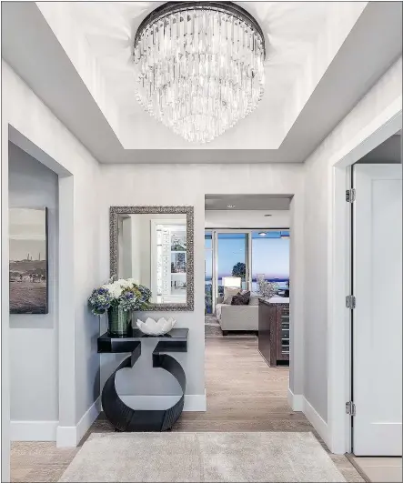  ??  ?? Lighting and ceiling details are among the most important design elements — and affordable — in a home, notes Insight Design’s Linda Gallo.