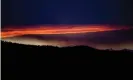  ?? Photograph: Cavan Images/Alamy ?? A sunset on a mountain ridge line and Ch-paa-qn peak.