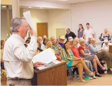  ?? MATTHEW REISEN/JOURNAL ?? Joel Carty shows support for an ordinance banning pot in the Village of Corrales during public comment at a council meeting on Tuesday.