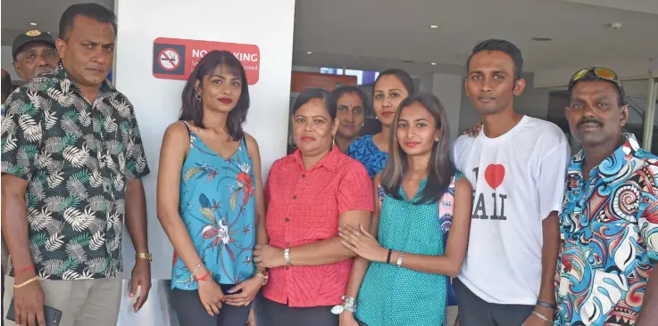  ?? Photo: Mereleki Nai ?? Wuhan University student, Sylvia Nandani (second from left) with family members at the Nadi Internatio­nal Airport on February 21, 2020.