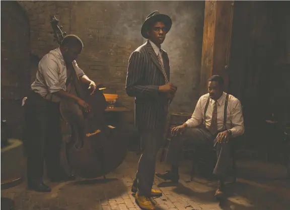  ?? PHOTOS: DAVID LEE/ NETFLIX ?? Actors Michael Potts, left, Chadwick Boseman and Colman Domingo portray jazz musicians in the captivatin­g new movie Ma Rainey's Black Bottom.