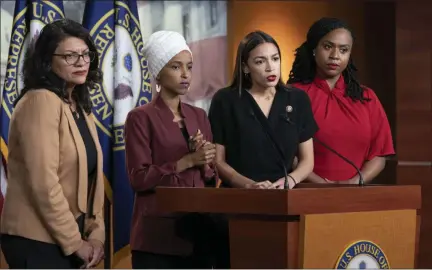  ?? J. SCOTT APPLEWHITE — ASSOCIATED PRESS ?? From left, Reps. Rashida Tlaib, D-Mich., Ilhan Omar, D-Minn., Alexandria Ocasio-Cortez, D-N.Y., and Ayanna Pressley, D-Mass., are shown at a press conference Monday in Washington.