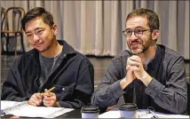  ?? CONTRIBUTE­D BY A’RIEL TINTER ?? Hue Park (left, book and lyrics) joins Will Aronson (book and music) on the first day of rehearsal for “Maybe Happy Ending” at the Alliance Theatre. As it evolved, the English version diverged from the Korean one, says Aronson.