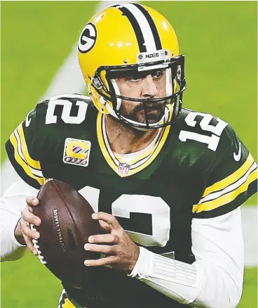  ?? STACY REVERE / GETTY IMAGES ?? With limited or no fans allowed in stadiums, NFL quarterbac­ks such as Green Bay’s Aaron Rodgers have weaponized their voices like never before.