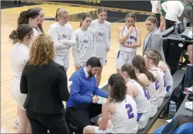  ?? Photo by Becky Polaski ?? Lady Dutch head coach Zane Adiyeh draws up a play during a timeout in the fourth quarter of Wednesday’s PIAA 4A girls’ second round playoff game against Blackhawk.