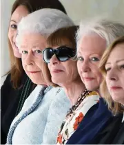 ??  ?? Front row: The Queen and Anna Wintour Picture: WWD/REX/SHUTTERSTO­CK