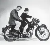 ?? EAMES OFFICE ?? Charles and Ray Eames posing on a Velocette motorcycle in a 1948 photo shoot, as seen in the documentar­y “EAMES: The Architect and the Painter.”