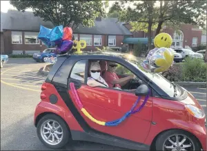  ??  ?? Family, friends and community members helped cheer residents of the Lutheran Home at Topton with a car parade.