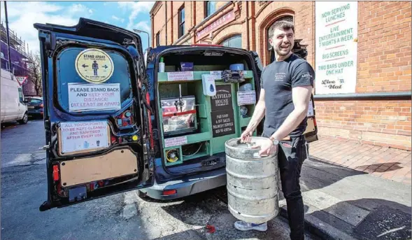  ?? AFP ?? The thirsty folks in Belfast, Northern Ireland can now order pints of brew delivered to their door.