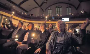  ?? TARA WALTON/THE NEW YORK TIMES FILE PHOTO ?? A vigil for the murder victims was held Feb. 4 at Metropolit­an Community Church in Toronto.