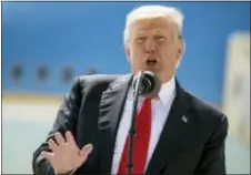  ?? AP PHOTO/ANDREW HARNIK ?? In this June 13, 2017, photo, President Donald Trump speaks in front of Air Force One in Milwaukee, Wis.